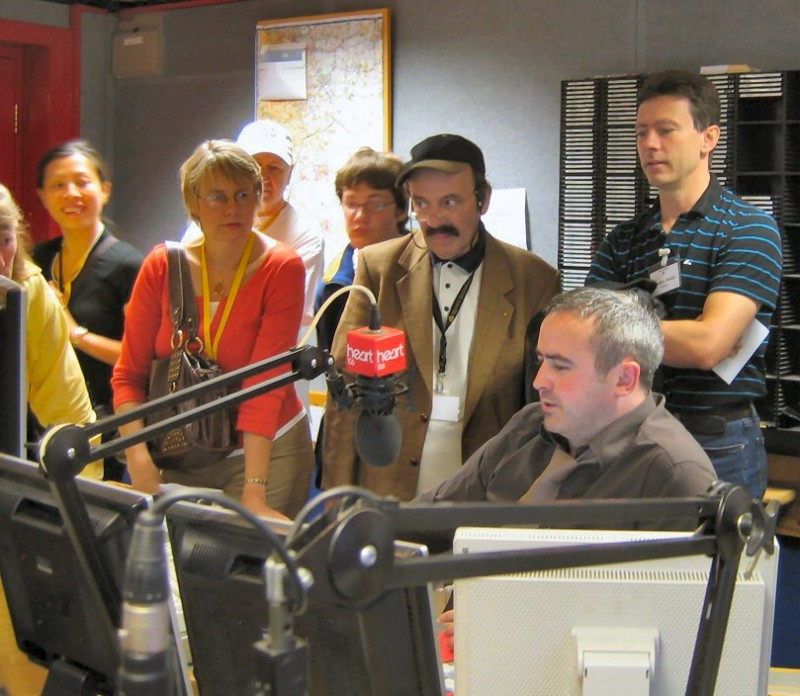 Picture of a members in the studio at Heart FM.
