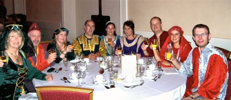 Picture of members dressed in costume at the Robin Hood banquet.