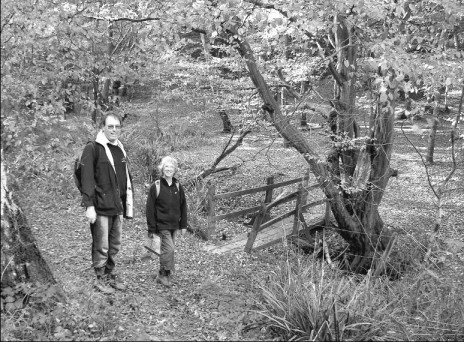 Picture of Richard and Gwen in leafy surroundings on their walk.