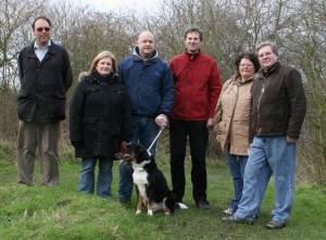 A group take a walk in Priory Park.