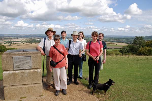 Seven Mensans plus one dog stand at the top of Coombe Hill