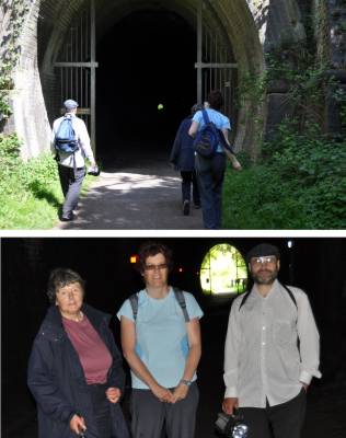 A pair of photographs showing the walkers entering the old railway tunnel, and posing inside the tunnel