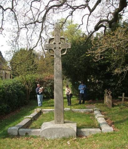 An art noveaux Celtic Cross stands at the Lee Church along the way.