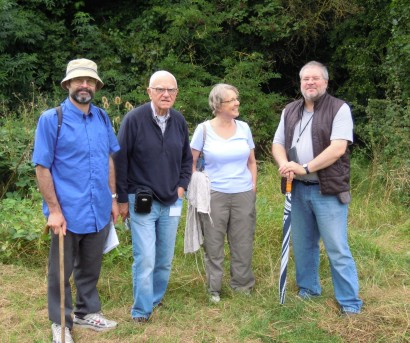 Four of the geocaching group stand ready for their hunt.