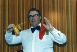 Photo of Bob Cooper performing a magic trick