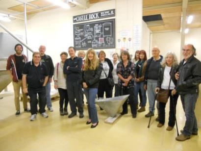 The group, having been coached in the brewing process