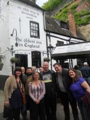 The group pose outside the pub claiming to be 'The Oldest Inn in England'