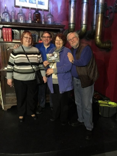 The group pose after making iy out od the escape room