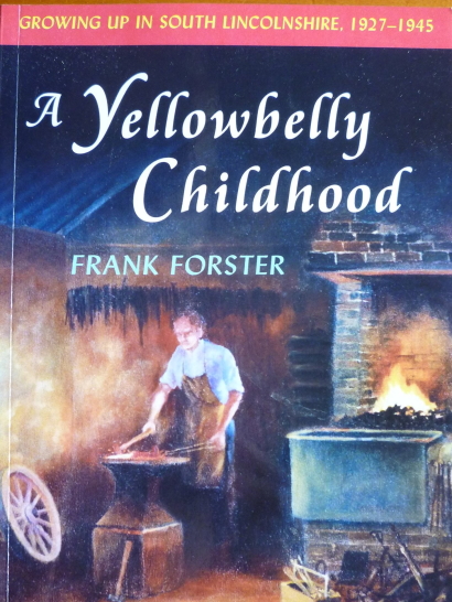 The book cover, showing a man working at a forge.