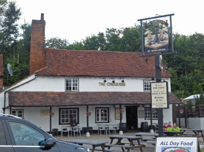 External view of the Chequers in Amersham, an old fashioned white-washed pub