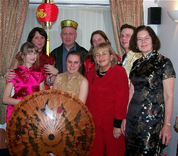 Picture of members in chinese dress at the Chinese New Year Party