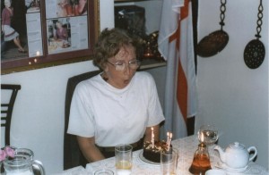 Picture of Gwen Jones blowing out her birthday cake.