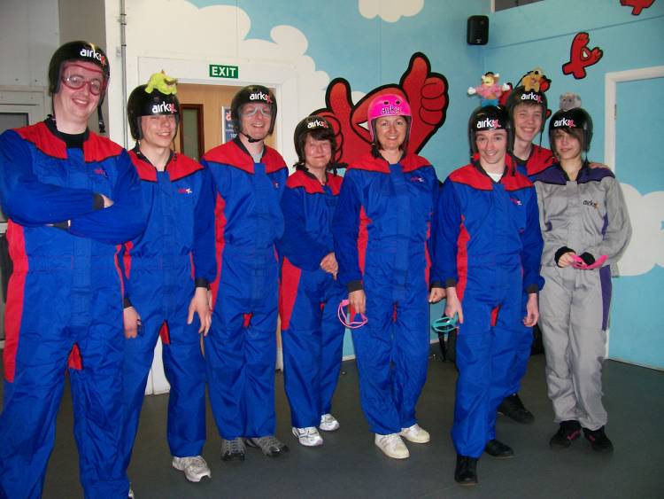 The group get ready for their indoor flying