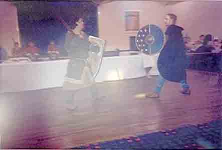 Picture of a demonstration sword fight.