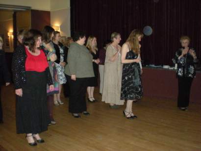 Guests get some line dancing instruction.