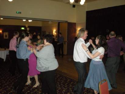 The dancers get to try a traditional dance step.