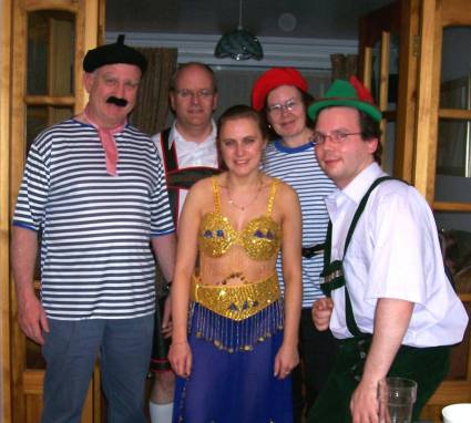 Picture of the eurovision party goers in their national costumes.