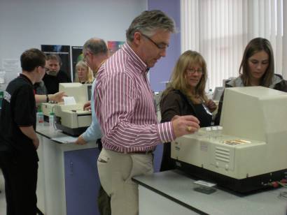 The group inspect desktop analysis machines.