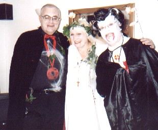 Picture of three members dressed as vampires