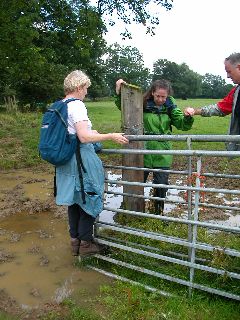 Picture of the group negotiating a muddy gate