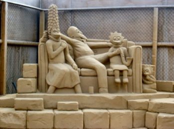 Picture of the Simpsons sand scupture showing Marge, Homer, Lisa and Maggie