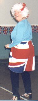Picture of a guest in a union jack wrap and cross of St George wig.
