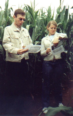 Picture of two of the group staring at maps and looking lost