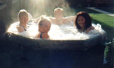 Picture of guests enjoying a dip in the hot tub.
