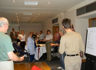Picture from of Sue Lord teaching some basic sign language