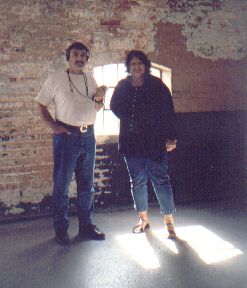 Picture of a couple of people in a spartan Southwell workhouse