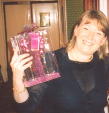 Veronique Roberts with her prize from the ticket draw
