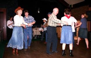 Another picture of the group square dancing