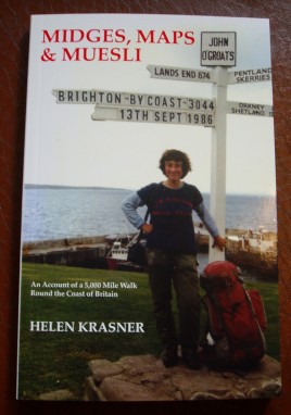 Picture of the front cover of the book, with Helen standing by a sign post at John O'Groats with pointers to Land's end and other distant places.