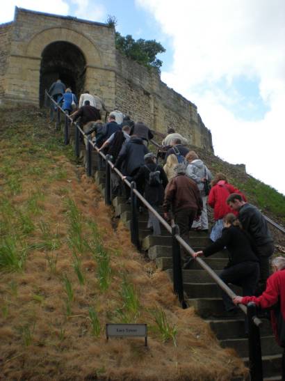 The group climb the 30+ steps up to the Lucy Tower at the castle.